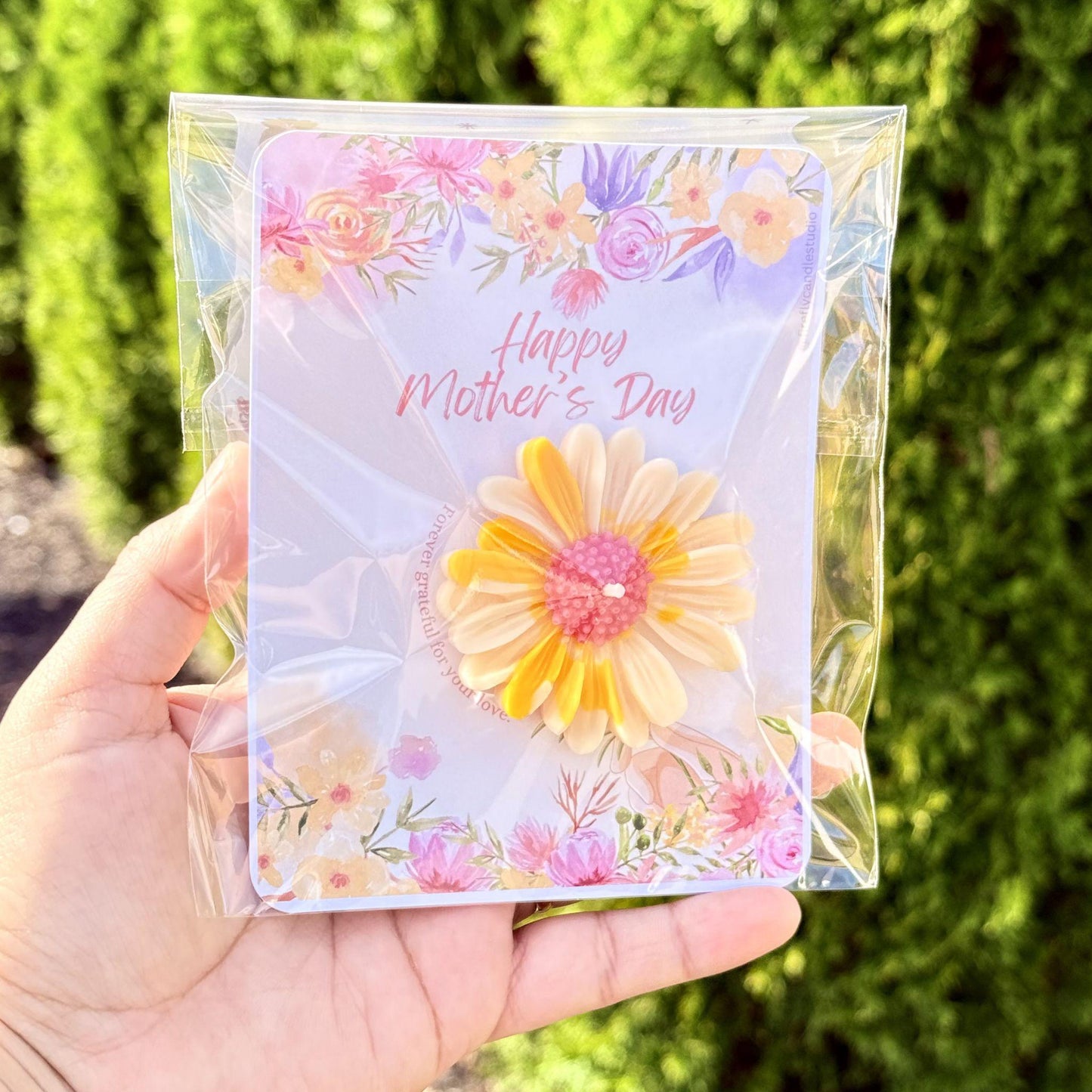 Tarjeta del Día de la Madre con vela de margarita