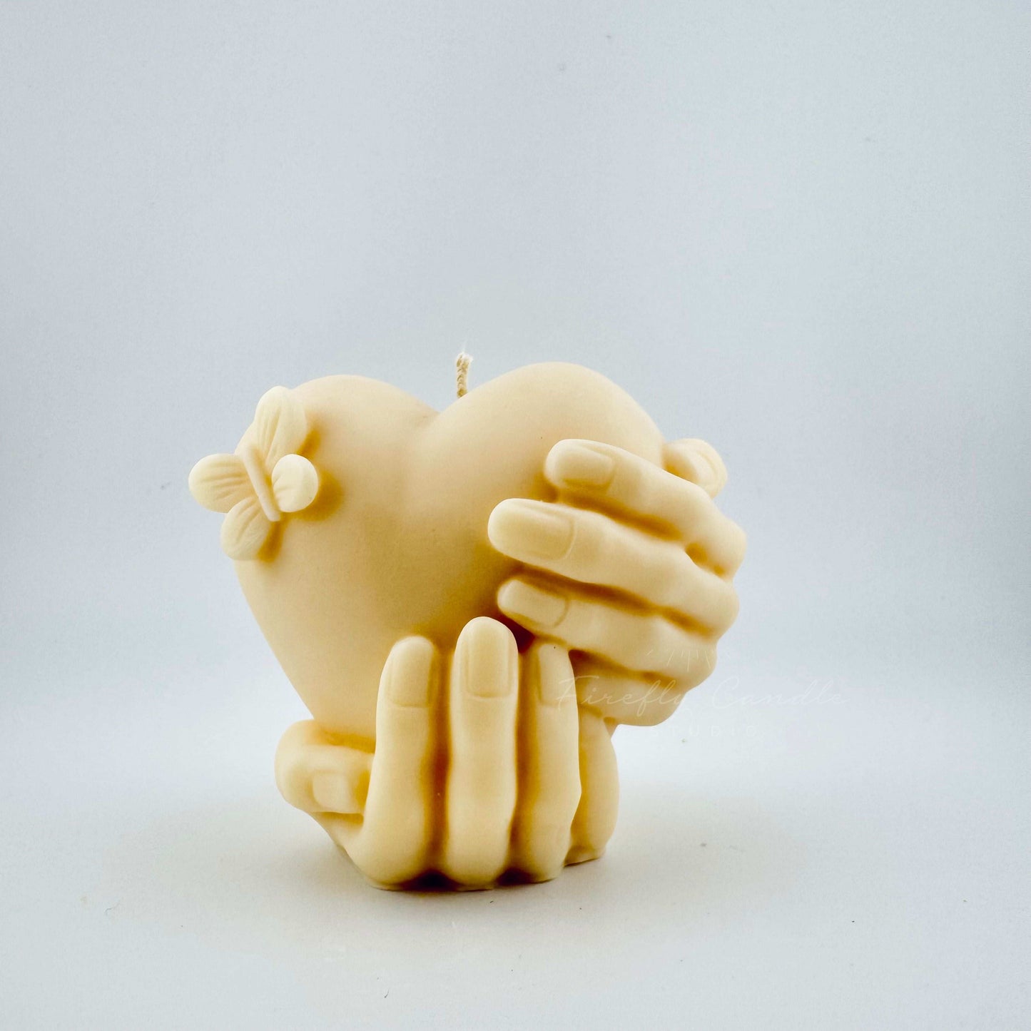 Holding Heart Candle